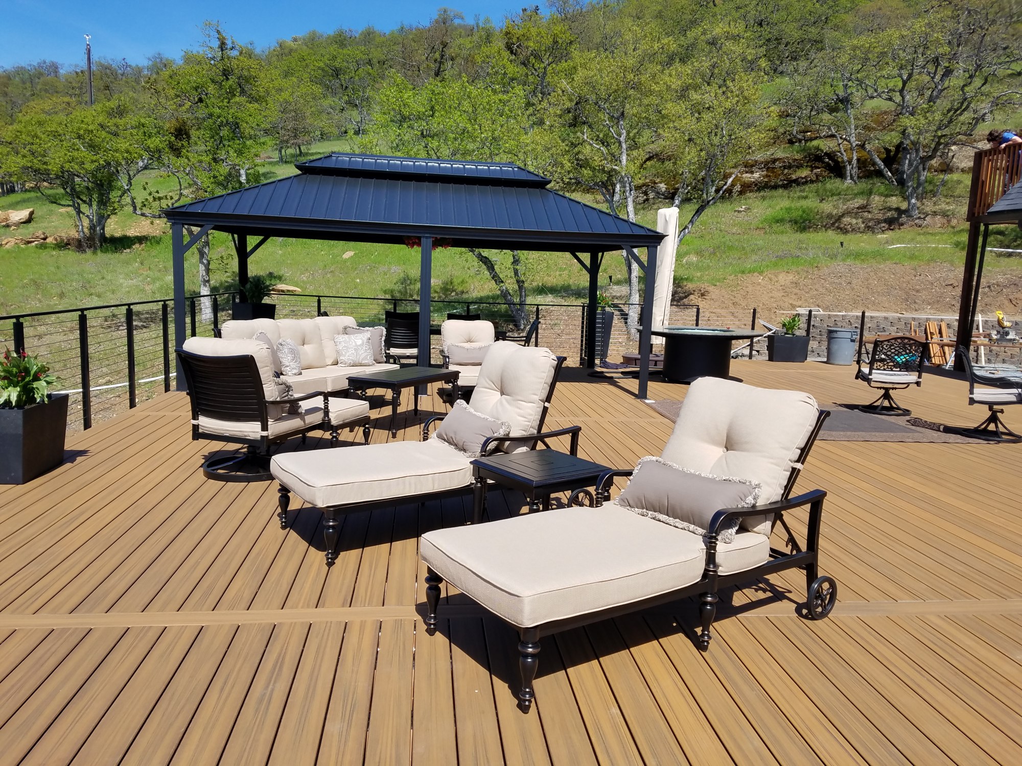 Large custom built trex deck with large pergola and patio sets